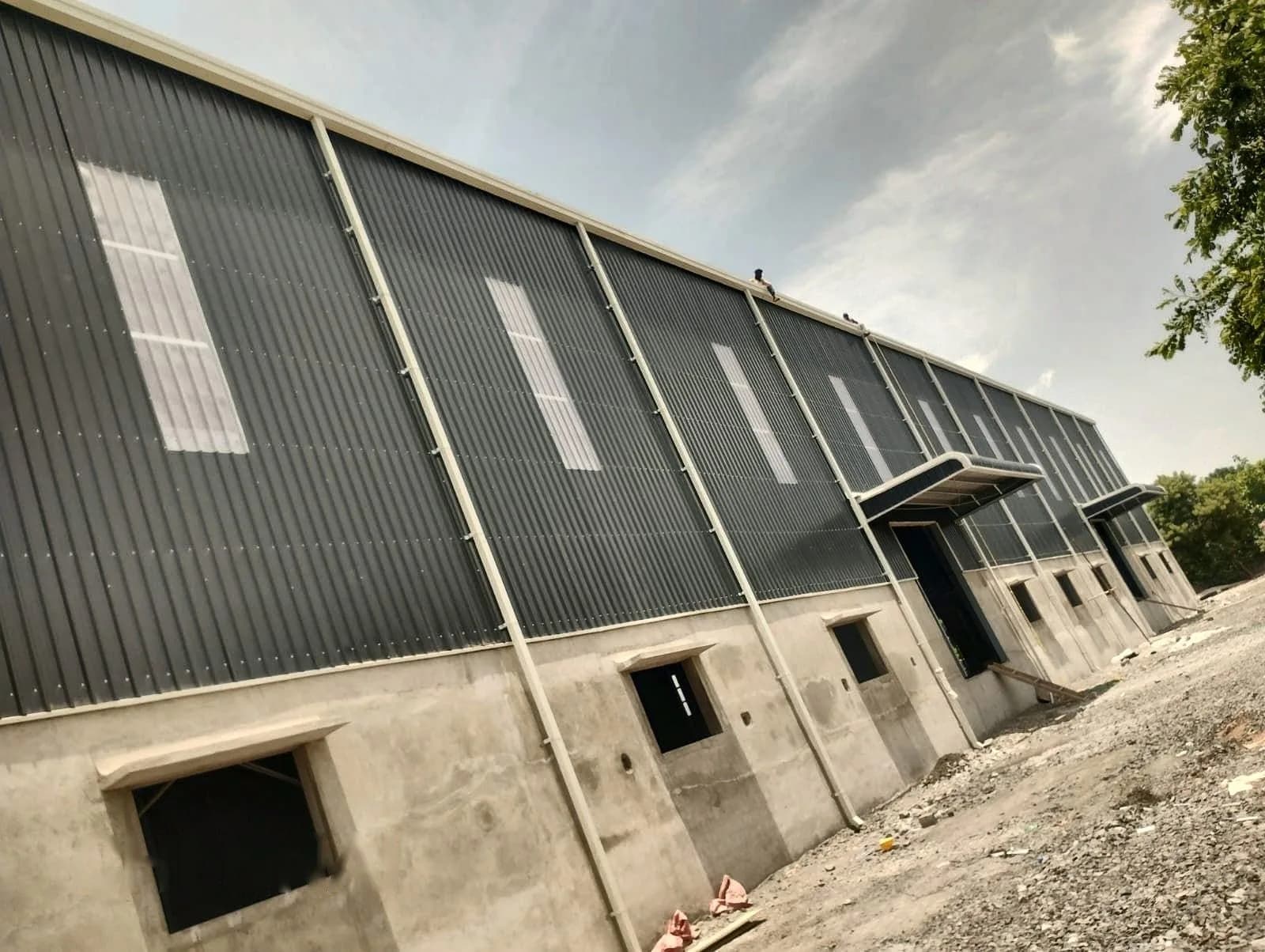 Industrial Building with Glass Facade — steel building by KVK PEB Solutions in Chennai, Tamil Nadu